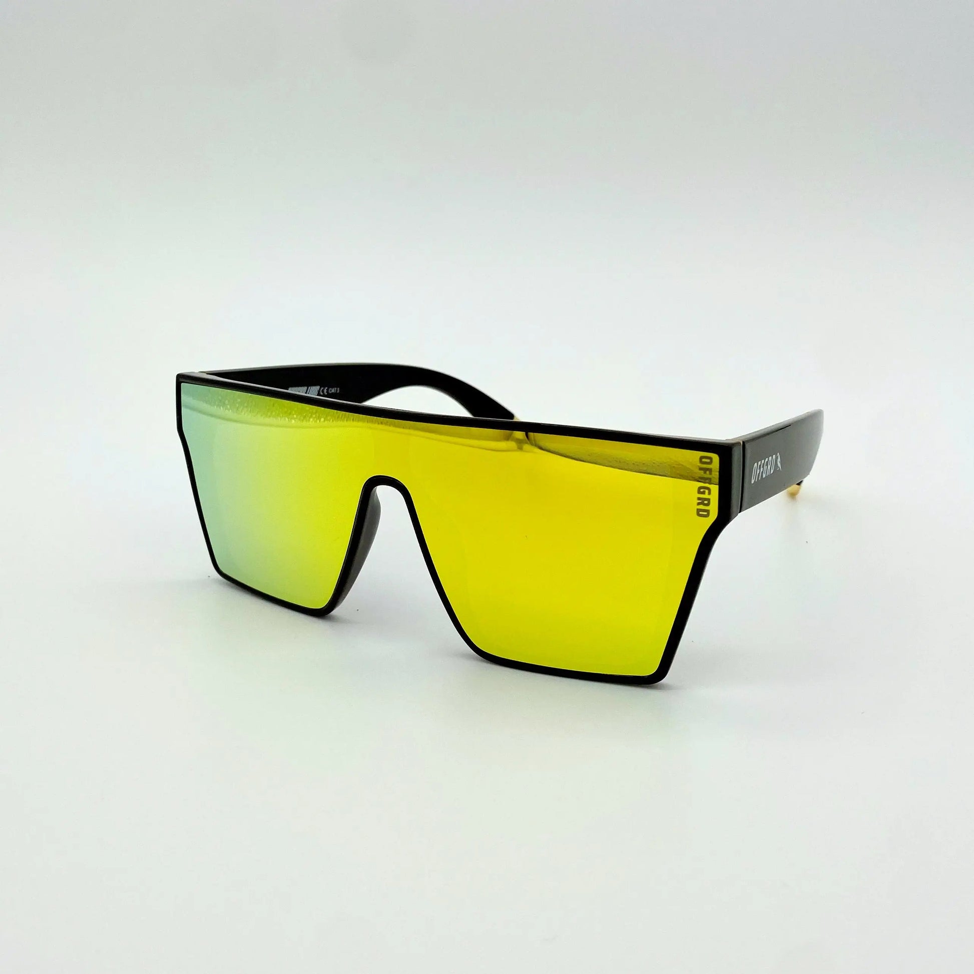 Sunglasses with yellow lenses and black frames on a white background