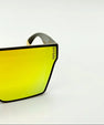 Sunglasses with yellow gold lenses on a white background